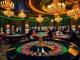 Experience the thrill of 79KING with players celebrating wins at a luxurious casino table.